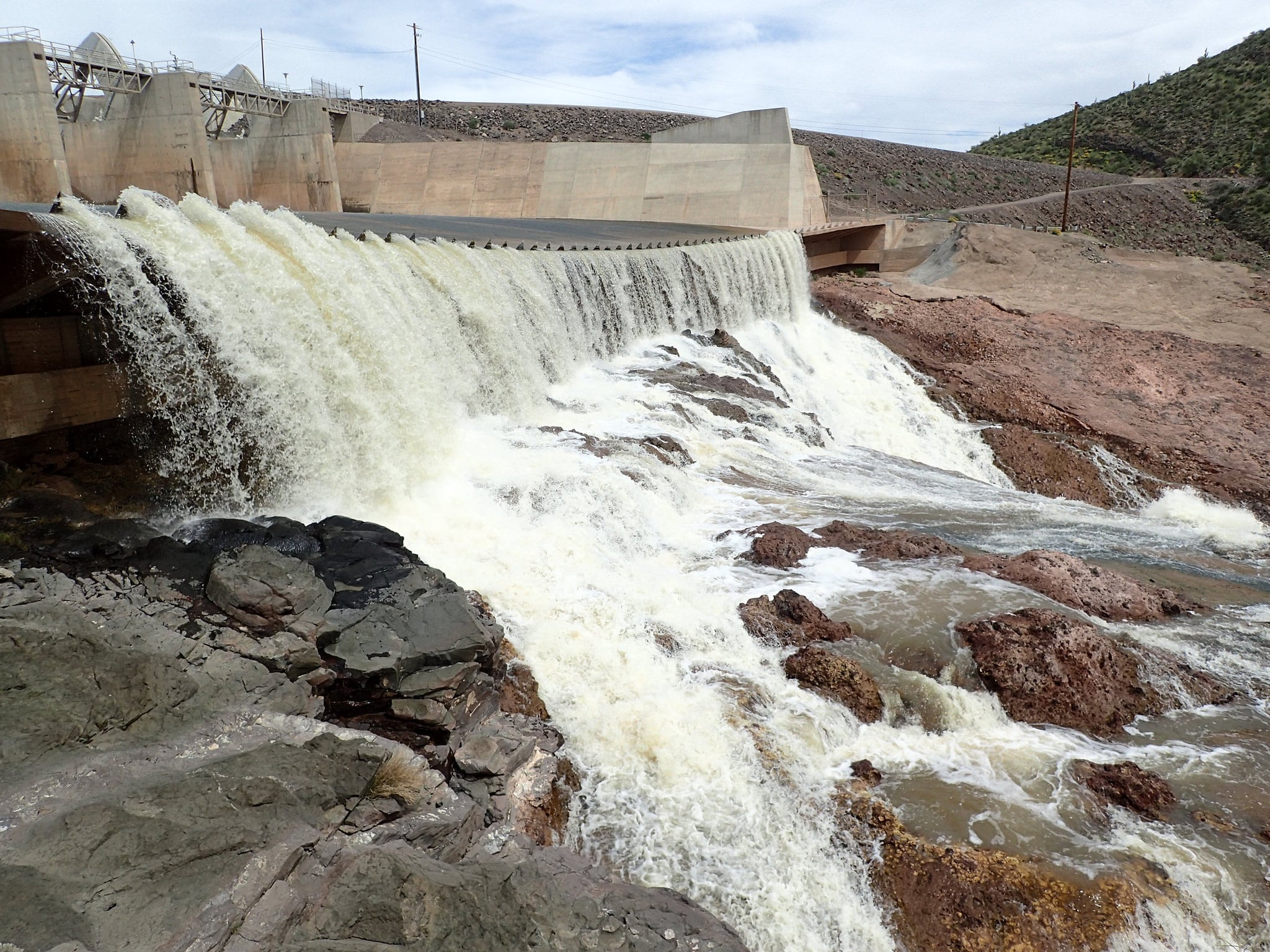 Walking behind a waterfall at Horseshoe Dam • rscottjon.es